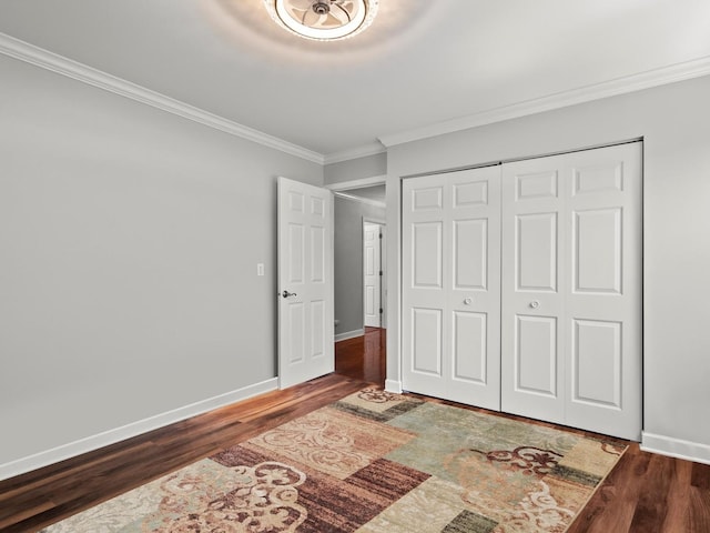 1520 Fordham Ct, Naperville, IL 60565 - unfurnished bedroom featuring ornamental molding, wood finished floors, a closet, and baseboards