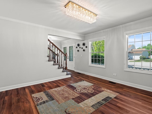 1520 Fordham Ct, Naperville, IL 60565 - entrance foyer featuring baseboards, a chandelier, ornamental molding, stairs, and wood finished floors