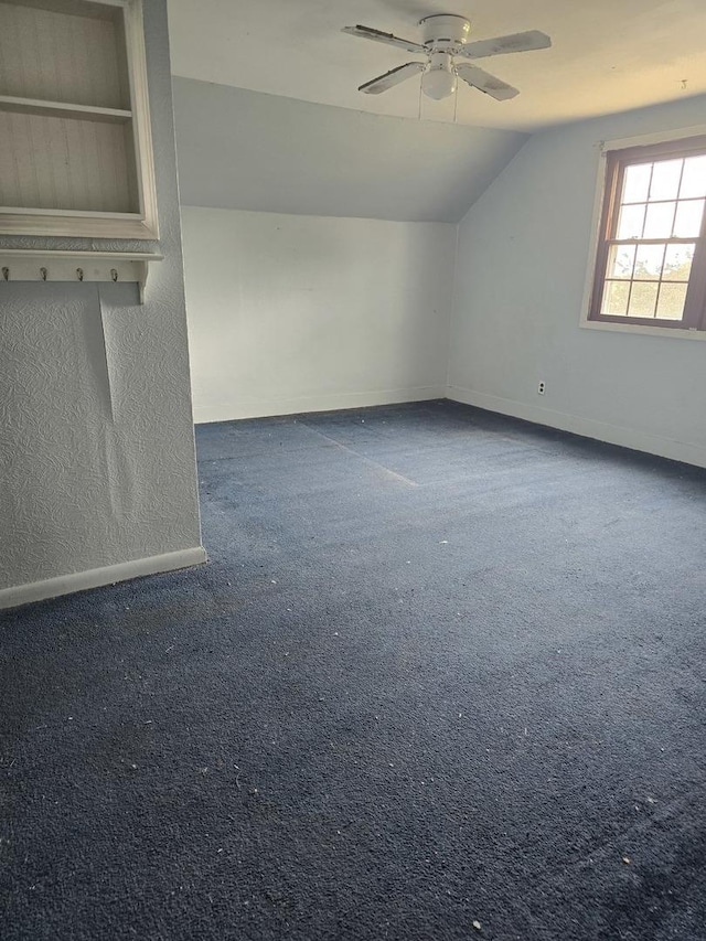 1350 N 2950 E Rd, Leroy, IL 61752 - bonus room featuring lofted ceiling, baseboards, ceiling fan, and carpet floors