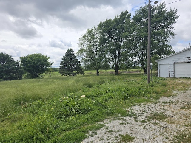 1350 N 2950 E Rd, Leroy, IL 61752 - view of yard with a garage