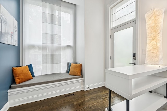 7223 N Hamilton Ave Unit A, Chicago, IL 60645 - living area featuring dark wood finished floors and baseboards