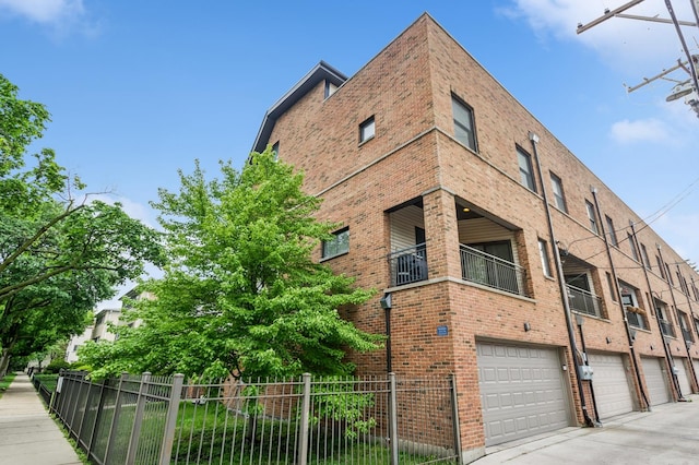 7223 N Hamilton Ave Unit A, Chicago, IL 60645 - view of property featuring an attached garage