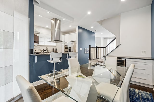 7223 N Hamilton Ave Unit A, Chicago, IL 60645 - dining space with stairs, recessed lighting, dark wood finished floors, wine cooler, and baseboards
