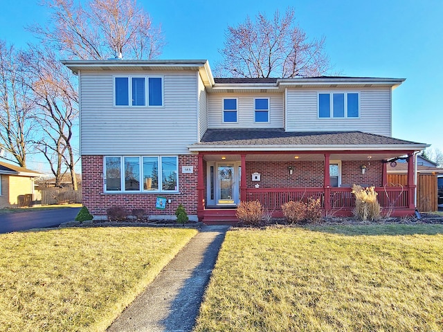 5831 W 109th St, Chicago Ridge, IL 60415 - view of front of home featuring brick siding, a front lawn, and a shingled roof