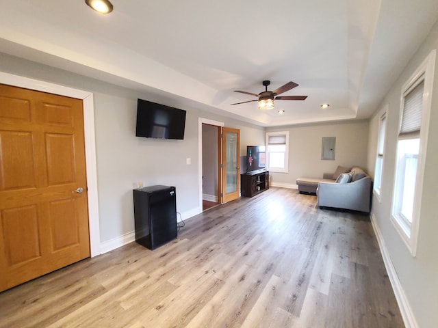 5831 W 109th St, Chicago Ridge, IL 60415 - living area featuring a raised ceiling, light wood-style floors, a ceiling fan, baseboards, and recessed lighting