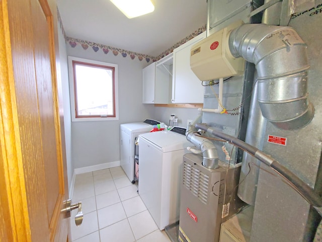 5831 W 109th St, Chicago Ridge, IL 60415 - washroom with cabinet space, separate washer and dryer, light tile patterned floors, and baseboards