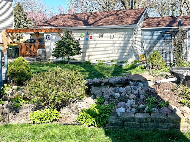 5831 W 109th St, Chicago Ridge, IL 60415 - view of property exterior featuring a shingled roof and a gate