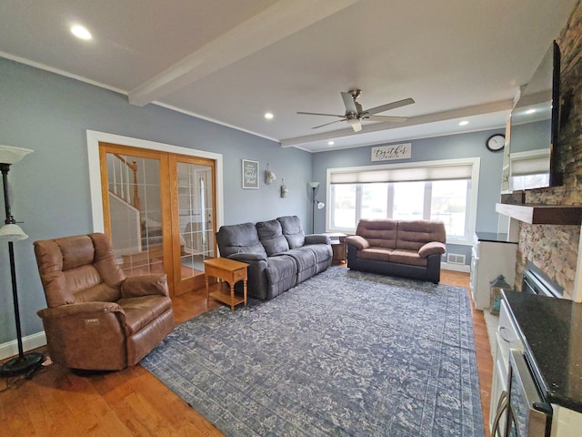 5831 W 109th St, Chicago Ridge, IL 60415 - living room with wood finished floors, ceiling fan, recessed lighting, a fireplace, and french doors