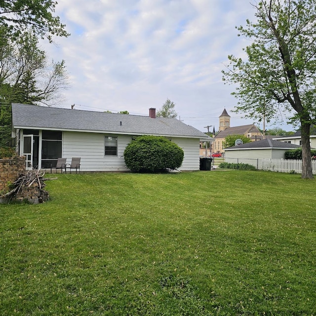 6 Johnson St, East Dundee, IL 60118 - back of property with a sunroom and a chimney