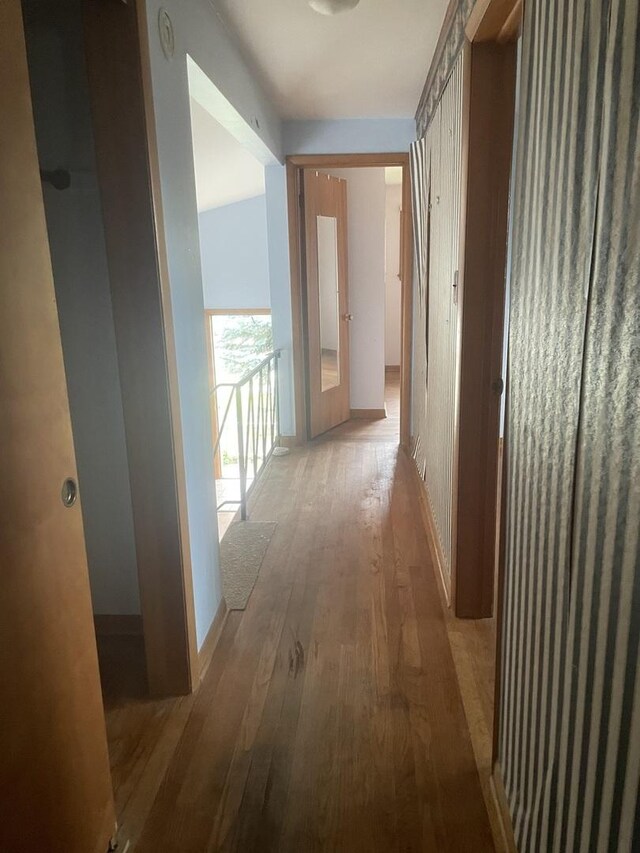 11011 W Roosevelt Rd, Westchester, IL 60154 - hall featuring light wood-type flooring and baseboards