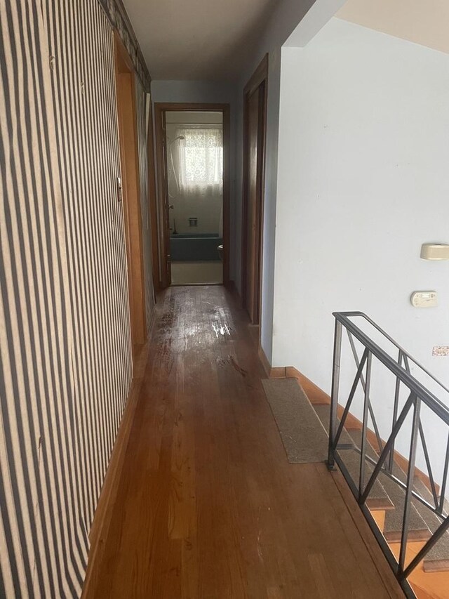 11011 W Roosevelt Rd, Westchester, IL 60154 - corridor with wood-type flooring
