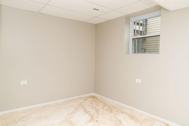 906 Central Park Dr, Round Lake Beach, IL 60073 - carpeted spare room with a paneled ceiling and baseboards