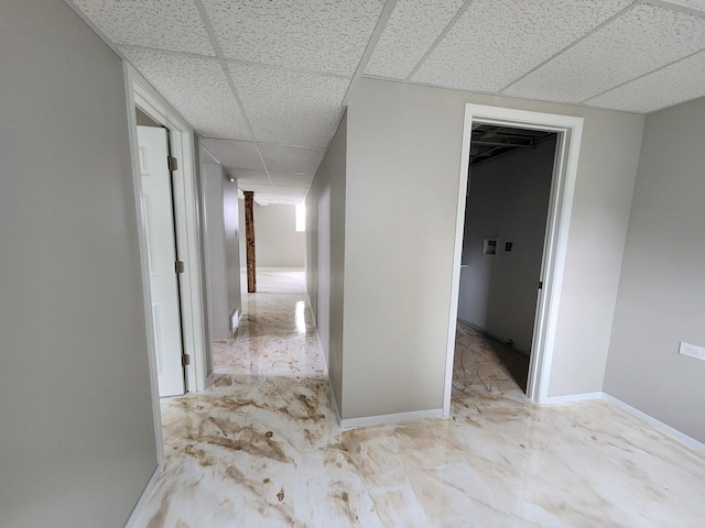 906 Central Park Dr, Round Lake Beach, IL 60073 - corridor featuring a paneled ceiling and baseboards