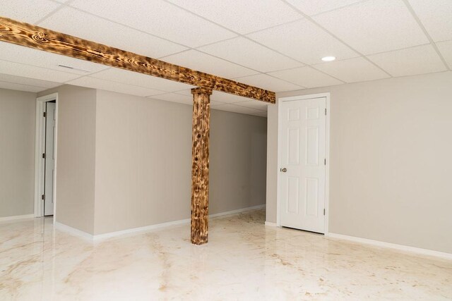 906 Central Park Dr, Round Lake Beach, IL 60073 - finished below grade area with a paneled ceiling, baseboards, and recessed lighting