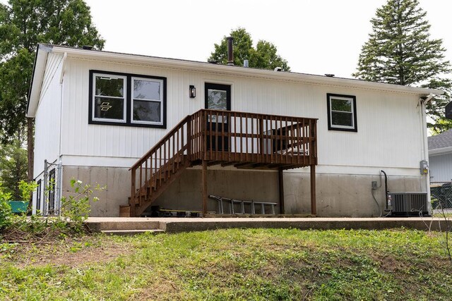 906 Central Park Dr, Round Lake Beach, IL 60073 - manufactured / mobile home with a wooden deck, central air condition unit, and stairs