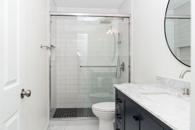 906 Central Park Dr, Round Lake Beach, IL 60073 - full bathroom featuring vanity, marble look tile flooring, toilet, and a stall shower