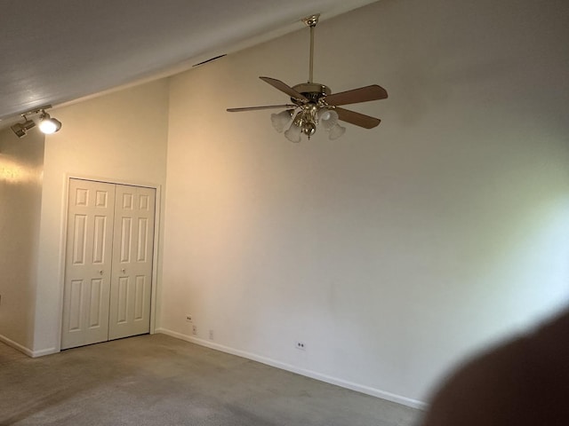 2S809 Grove Ln, Warrenville, IL 60555 - carpeted empty room featuring lofted ceiling, ceiling fan, and baseboards