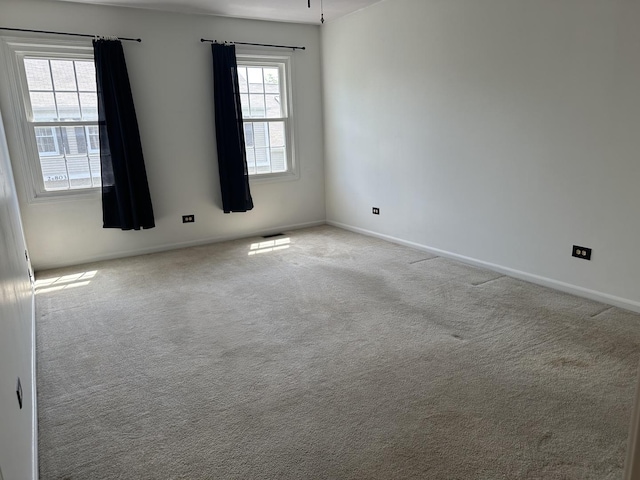 2S809 Grove Ln, Warrenville, IL 60555 - carpeted empty room featuring baseboards