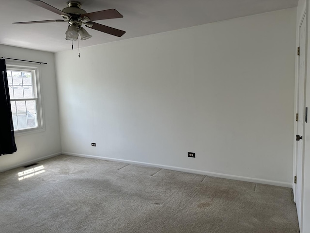 2S809 Grove Ln, Warrenville, IL 60555 - unfurnished room with ceiling fan, light colored carpet, and baseboards