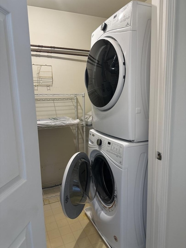 2S809 Grove Ln, Warrenville, IL 60555 - laundry room featuring stacked washer / dryer