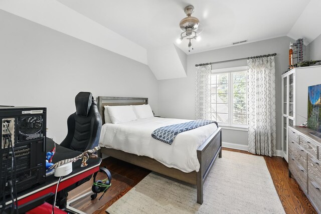 610 Greendale Rd, Glenview, IL 60025 - bedroom with wood finished floors, lofted ceiling, and baseboards