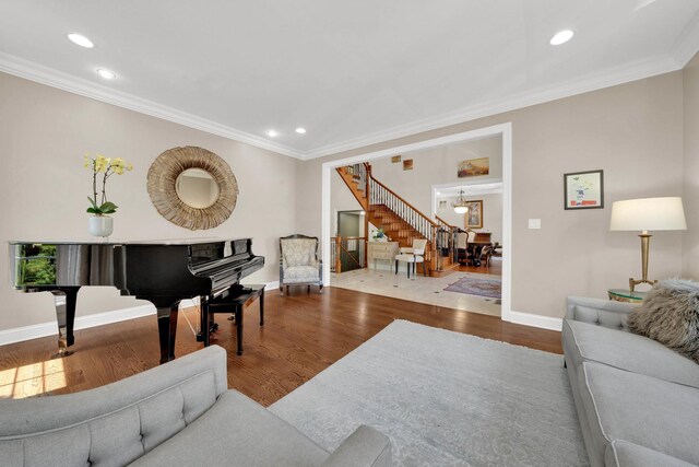 610 Greendale Rd, Glenview, IL 60025 - living room with wood finished floors, stairway, recessed lighting, baseboards, and crown molding