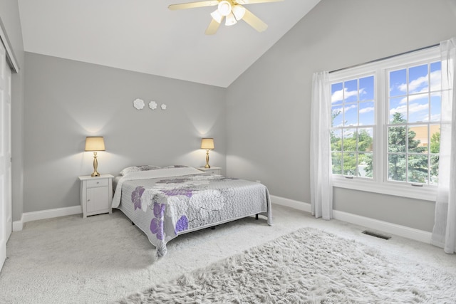 1086 Brighton Dr, Carol Stream, IL 60188 - bedroom with vaulted ceiling, light carpet, baseboards, ceiling fan, and a closet