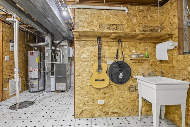 1086 Brighton Dr, Carol Stream, IL 60188 - unfinished basement featuring gas water heater, tile patterned floors, and heating unit