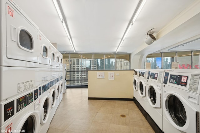 300 N State St Unit 3205, Chicago, IL 60654 - communal laundry room with stacked washer / drying machine, separate washer and dryer, and a city view