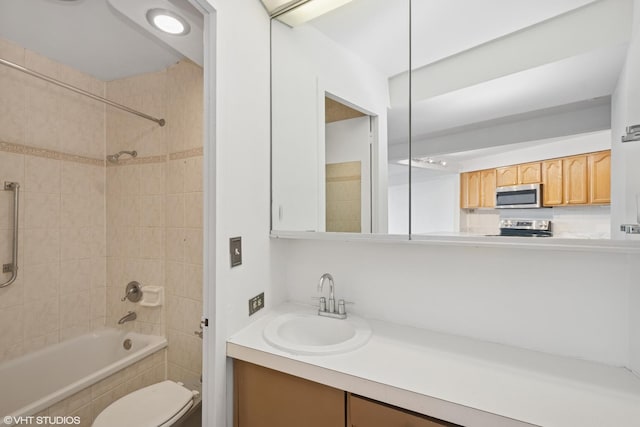 300 N State St Unit 3205, Chicago, IL 60654 - bathroom with vanity, tiled shower / bath, and toilet