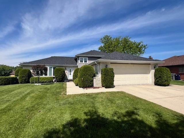 15318 Raintree Dr, Orland Park, IL 60462 - tri-level home with a garage, driveway, a front yard, and brick siding