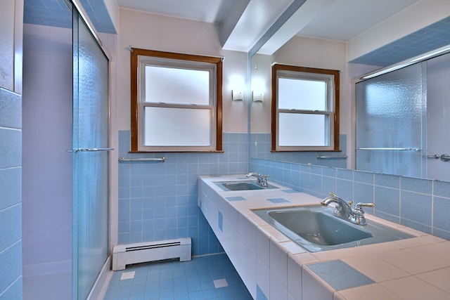 2808 Struckman Ave, River Grove, IL 60171 - bathroom featuring a baseboard radiator, tile patterned flooring, a shower stall, double vanity, and tile walls