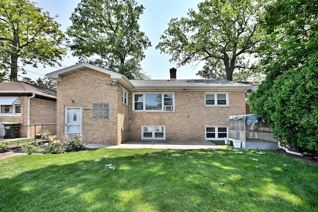 2808 Struckman Ave, River Grove, IL 60171 - rear view of house featuring a chimney, a patio area, and brick siding