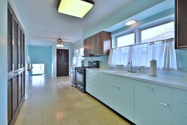 2808 Struckman Ave, River Grove, IL 60171 - kitchen with gas stove, light countertops, healthy amount of natural light, and a ceiling fan