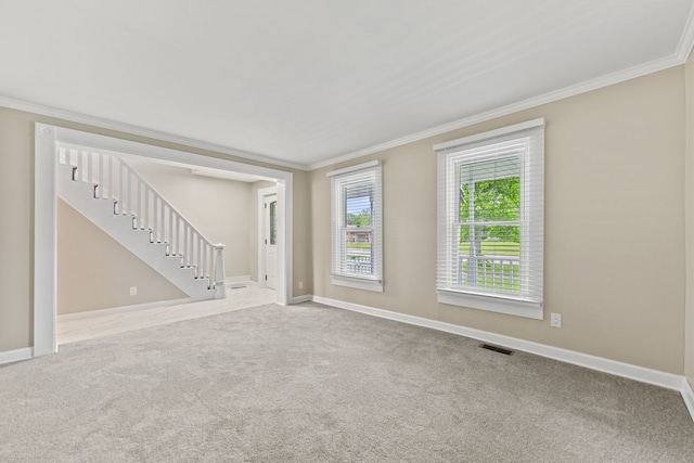 217 W Mazon Ave, Dwight, IL 60420 - carpeted spare room with ornamental molding, baseboards, and stairway