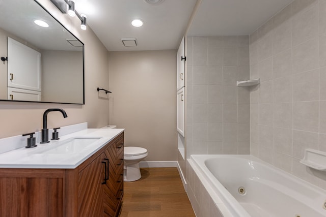217 W Mazon Ave, Dwight, IL 60420 - full bath featuring vanity, toilet, wood finished floors, recessed lighting, and baseboards