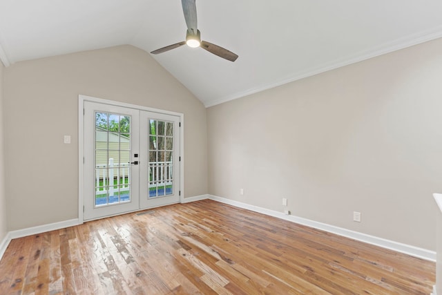 217 W Mazon Ave, Dwight, IL 60420 - spare room featuring french doors, a ceiling fan, light wood finished floors, vaulted ceiling, and baseboards