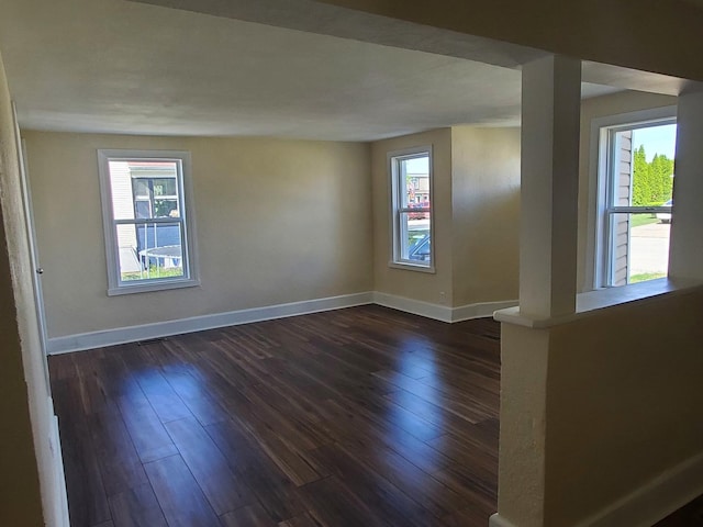 53 N Walnut St, Manteno, IL 60950 - unfurnished room with baseboards and dark wood-type flooring