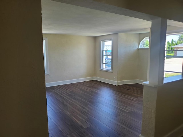 53 N Walnut St, Manteno, IL 60950 - unfurnished room with baseboards and dark wood-type flooring