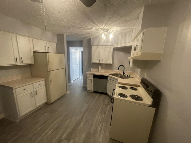 1616 Richmond Cir Unit 101, Joliet, IL 60435 - kitchen with white appliances, a sink, white cabinetry, and a textured ceiling