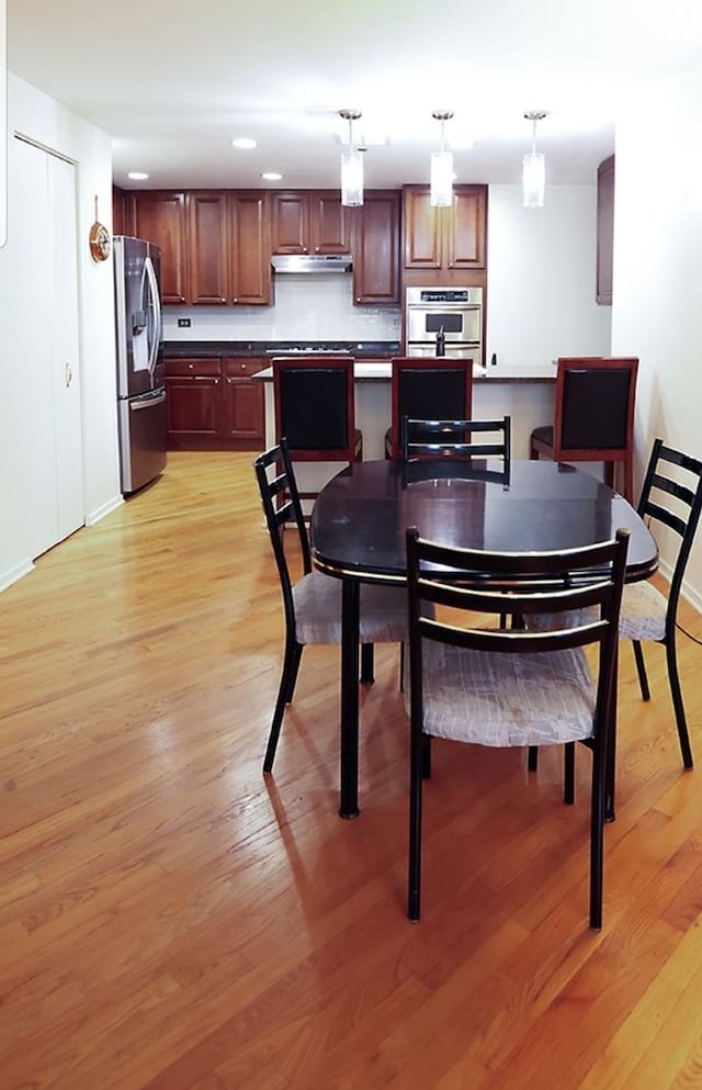 910 S Michigan Ave Unit 1805, Chicago, IL 60605 - dining room with light wood-style flooring and recessed lighting