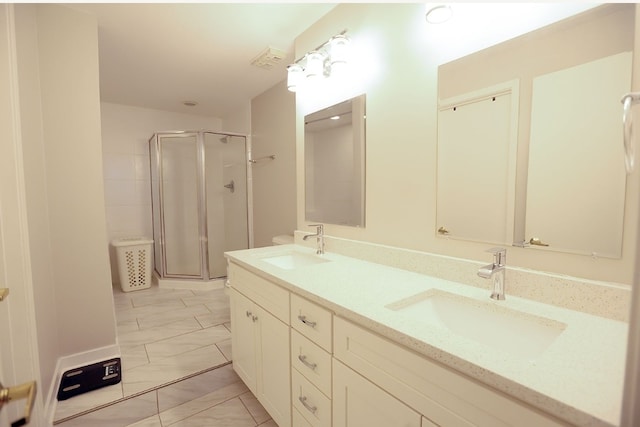 910 S Michigan Ave Unit 1805, Chicago, IL 60605 - bathroom with a shower stall and double vanity