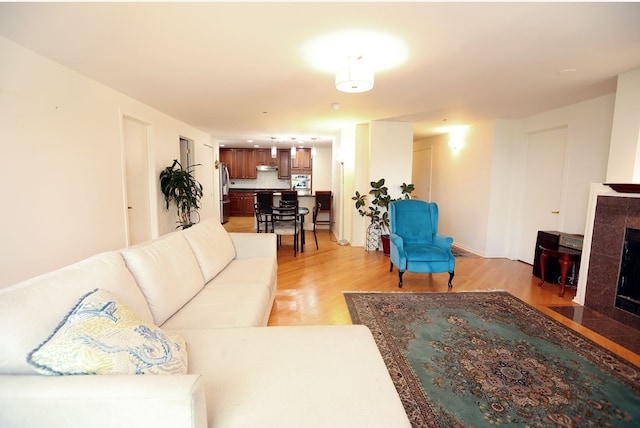 910 S Michigan Ave Unit 1805, Chicago, IL 60605 - living room with a fireplace and light wood-style floors