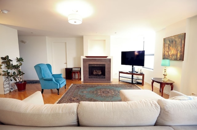 910 S Michigan Ave Unit 1805, Chicago, IL 60605 - living room featuring a fireplace with flush hearth and wood finished floors