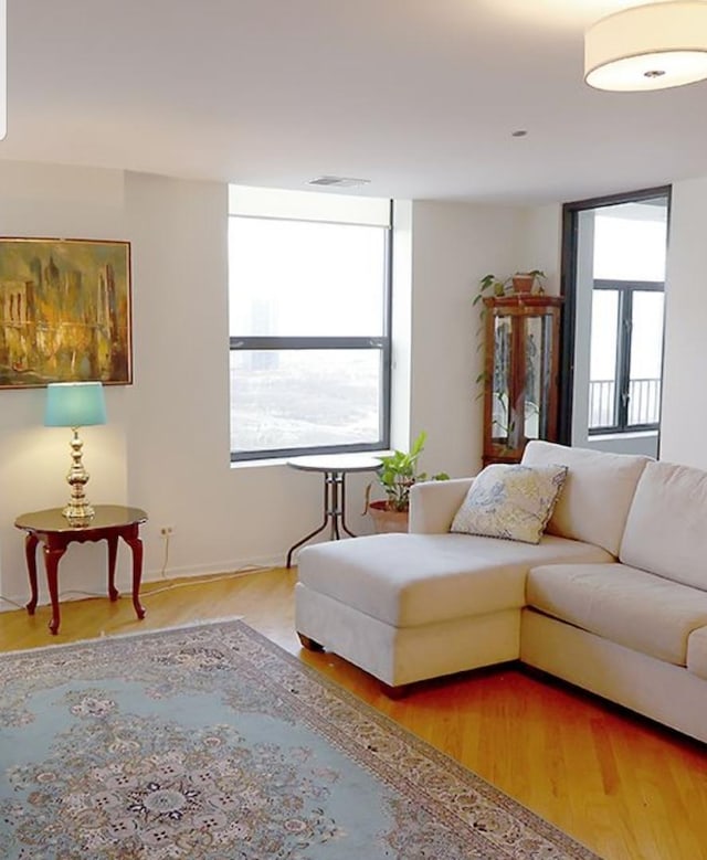 910 S Michigan Ave Unit 1805, Chicago, IL 60605 - living area with plenty of natural light and wood finished floors