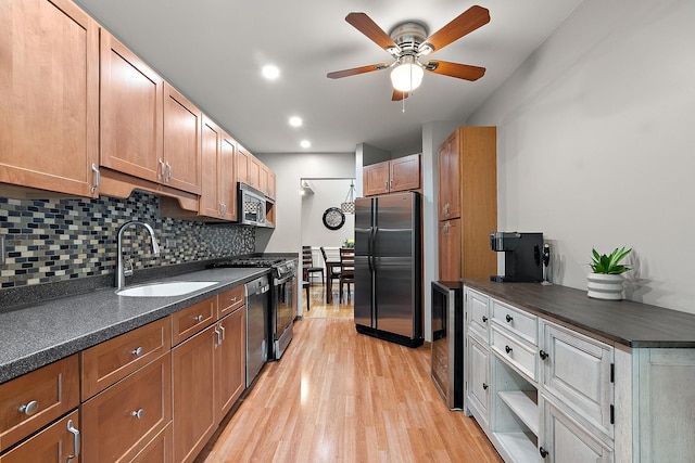 9254 Windsor Pkwy, Tinley Park, IL 60487 - kitchen with appliances with stainless steel finishes, a sink, dark countertops, wine cooler, and a ceiling fan
