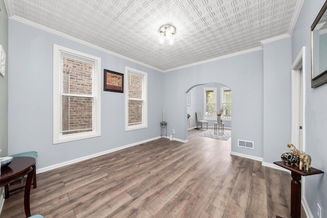 5635 S May St, Chicago, IL 60621 - spare room with arched walkways, an ornate ceiling, dark wood-type flooring, baseboards, and crown molding