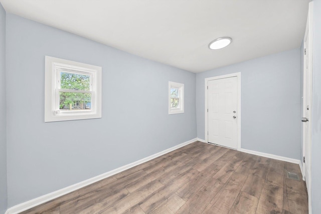5635 S May St, Chicago, IL 60621 - unfurnished room with wood finished floors and baseboards