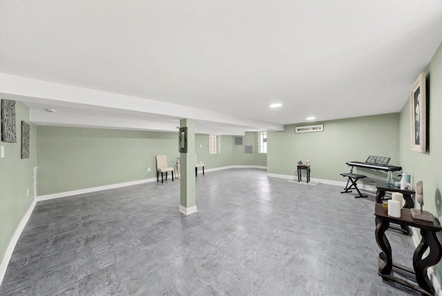 5635 S May St, Chicago, IL 60621 - basement featuring baseboards, a wall mounted AC, and recessed lighting