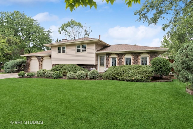 253 Waxwing Ave, Naperville, IL 60565 - split level home with brick siding, a front yard, an attached garage, and driveway